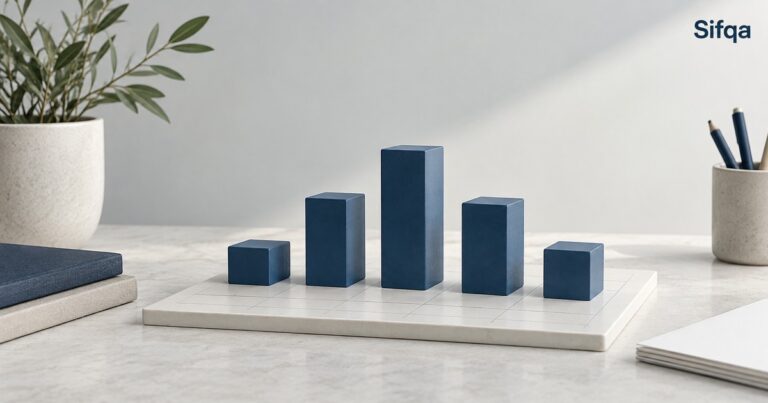 Blue rectangular blocks of different heights arranged like a bar chart on a pale board.